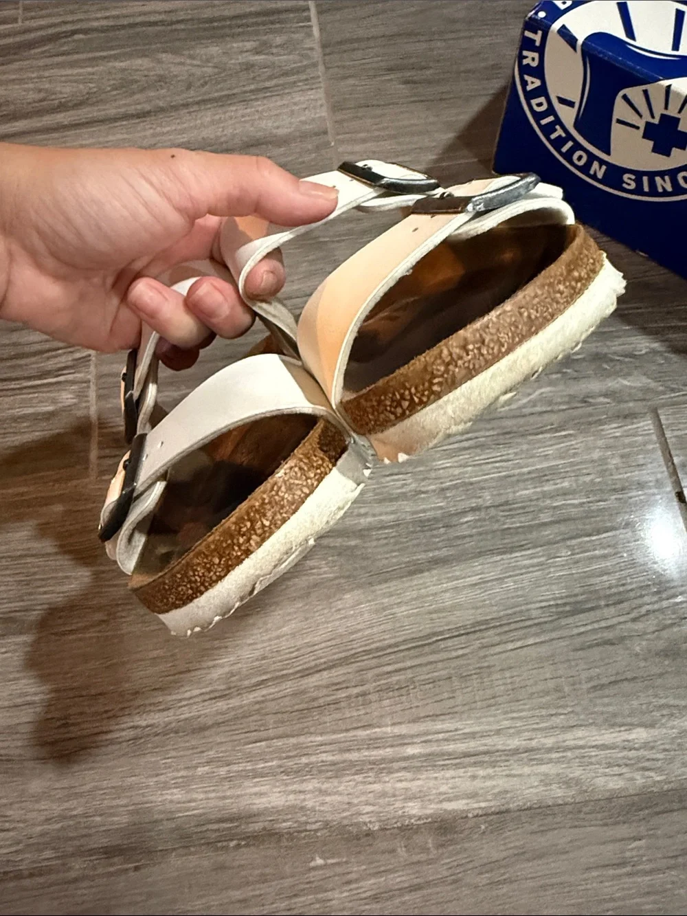 Birkenstock White Two-Strap Arizona Sandals with Silver Buckles